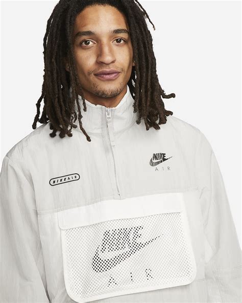 Nike Air gewebte Herrenjacke mit Futter. Nike AT